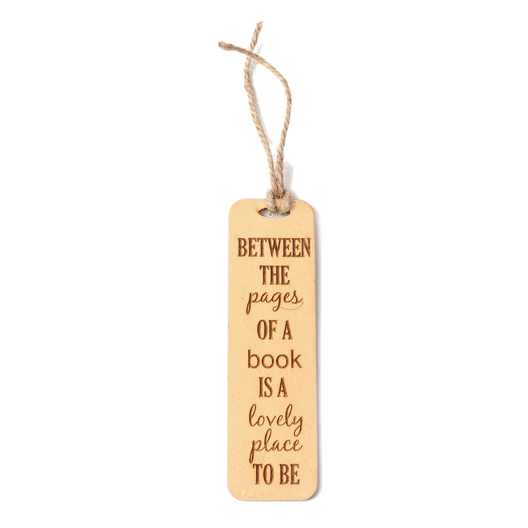 Between the pages of a book is a lovely place to be - Wooden Bookmark - The Engraved Store